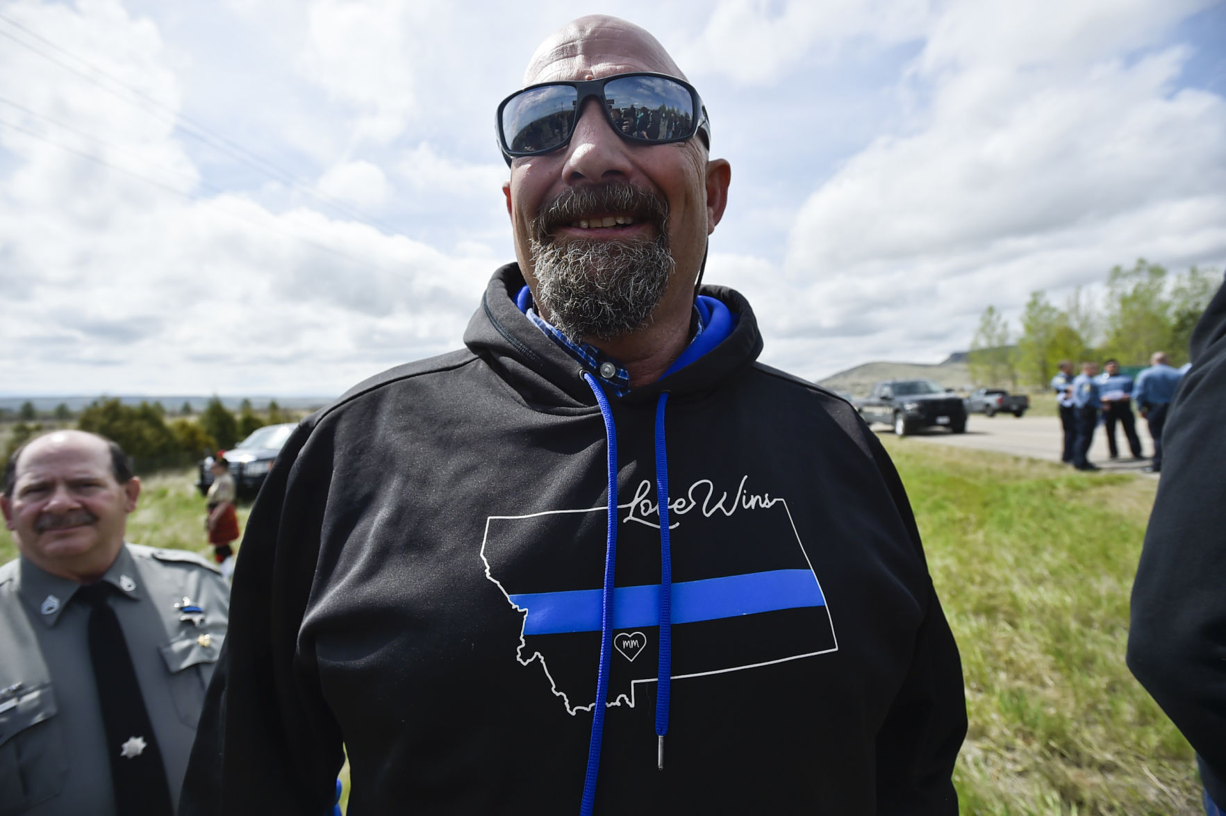 Pastor Curtis Crow wears a sweatshirt